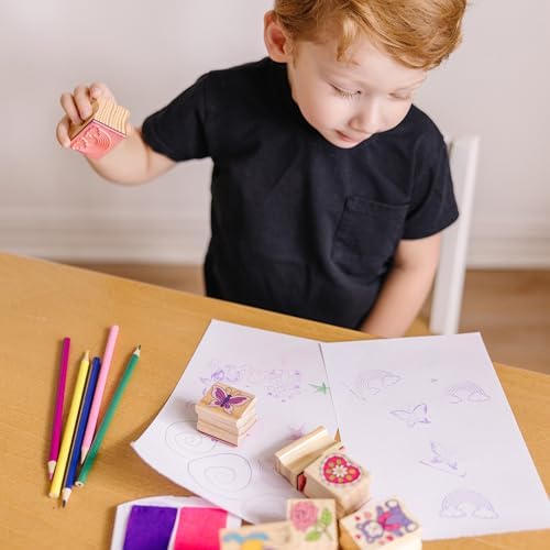 Child using Melissa & Doug Friendship Stamp Set
