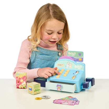 Child playing with Bluey Cash Checkout